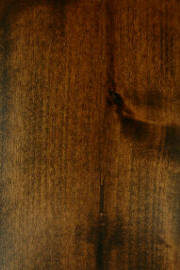 "F" on knotty alder doors