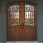 Barcelona Knotty Alder Wood Wrought Iron Exteriors Doors